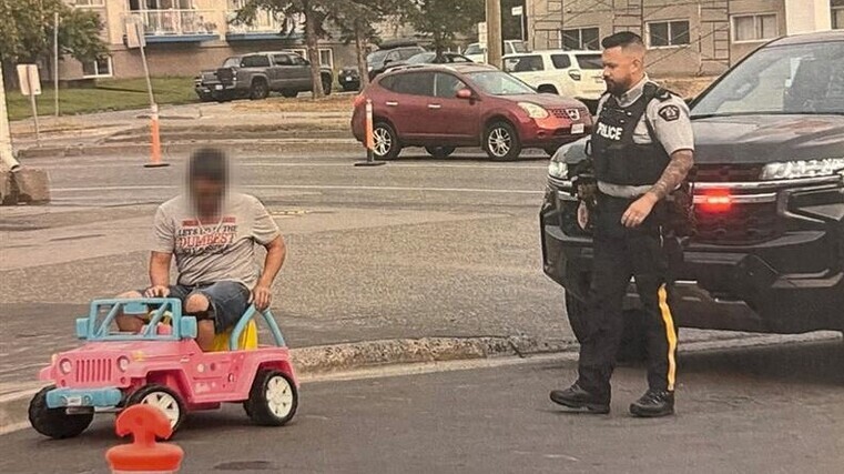 Arrest for driving toy Barbie car