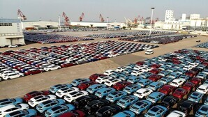 Asian ports hit by storms