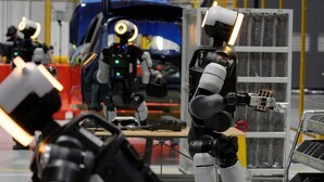 Robots train for car production