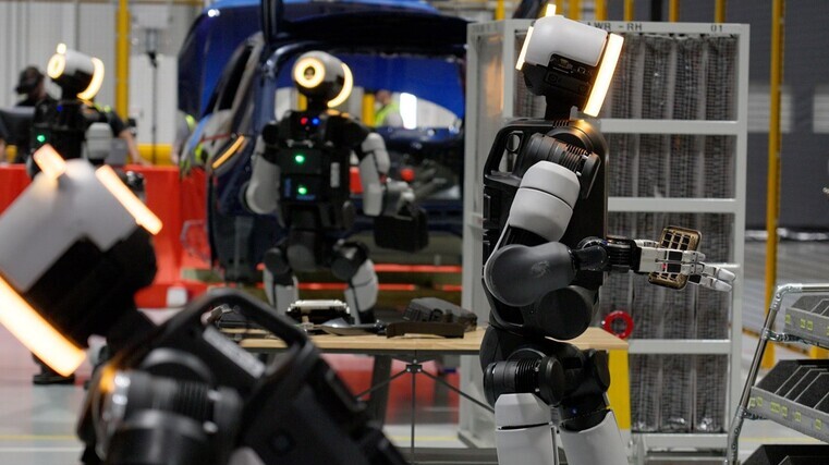 Robots train for car production